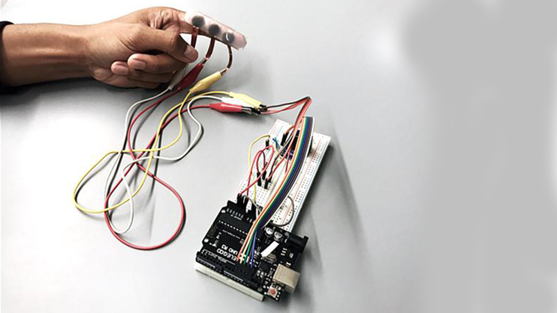 A Purdue University team created wearable technology to convert mechanical energy into electrical energy (Credit: Wenzhuo Wu/ Purdue University)