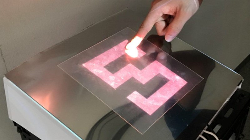 The display uses a heated polymer sheet to create adhesion on the surface (Credit: Osaka University)