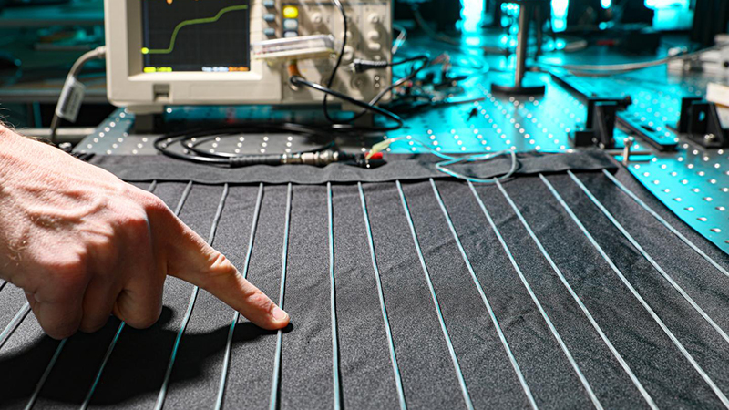 The electronic fibres can be used to collect data about our bodies by measuring fabric deformation (Credit: EPFL)