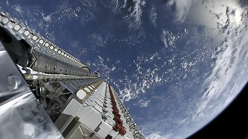 Starlink satellites before deployment into orbit from a carrier spacecraft (Credit: SpaceX)