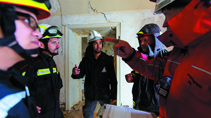 Joshua Macabuag with structural engineers undergoing disaster relief training