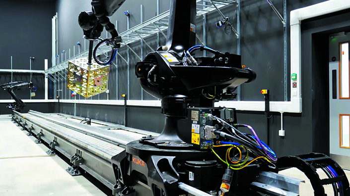 A device undergoes testing on a robotic arm in the IOSM yard (Credit: Satellite Applications Catapult)
