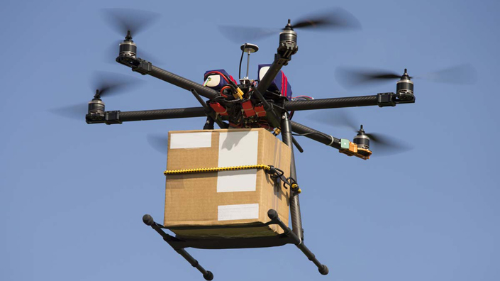 Delivery for you… a drone carries a parcel to a customer (credit: iStock)