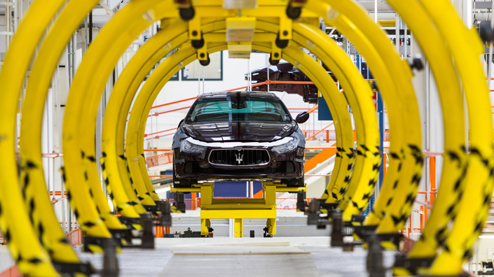 Maserati Ghibli luxury cars move along the semi-automated production line at Fiat SpA’s Grugliasco ‘digital’ factory in Turin, Italy