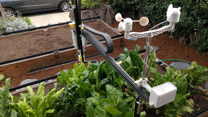 FarmBot can be augmented with a weather station so that it can collect environmental data to farm smarter over time