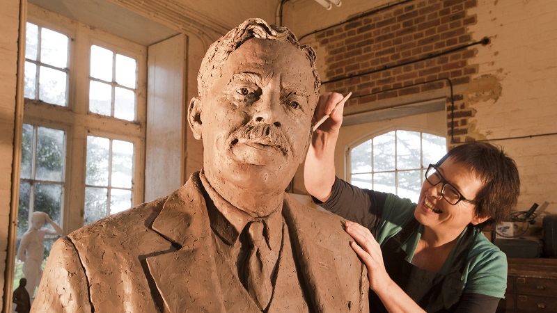 Sculptor Hazel Reeves working on Sir Nigel Gresley statue - photo by Roger Bamber