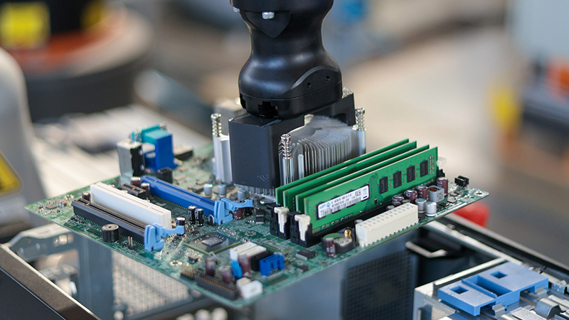 Robot Fixing Computer Autonomous robot takes computers apart to tackle growing e-waste problem