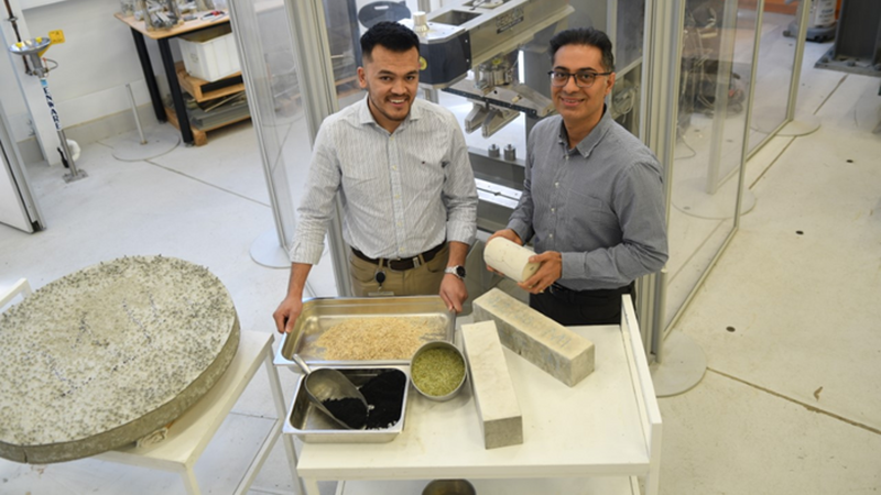Dr Aliakbar Gholampour, right, and PhD candidate Zakir Ikhasi, who use natural fibres and waste products to make more sustainable concrete (Credit: Flinders University)