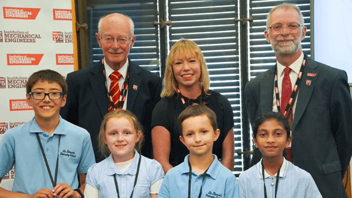 Former IMECHE President Peter Flynn, CEO Dr Alice Weaving OBE and President Phil Peele with students from St Teresa Primary School