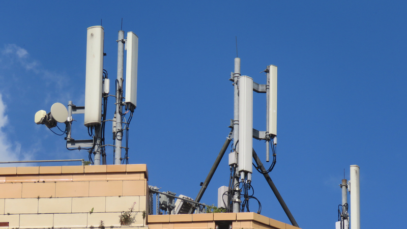 The metamaterial antenna can harvest energy from ambient radio waves, such as those from mobile phone towers (Credit: Shutterstock)