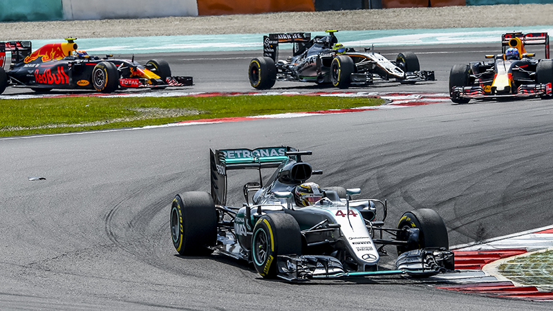 Lewis Hamilton leads the pack during a 2016 Formula One Grand Prix (Credit: Shutterstock)